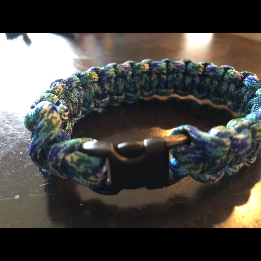 Nine inch blue white and green paracord bracelet